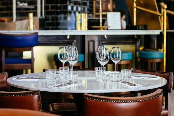 What Are the Key Ingredients for Designing a Warm and Inviting Restaurant Ambience?